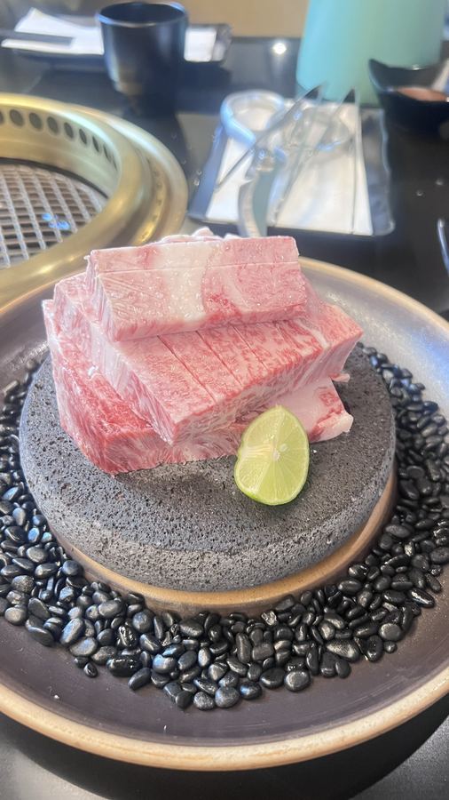 Marbled wagyu on a lava stone